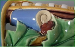 Lead-glaze earthenware glaze miss showing buff biscuit 'block-painted' with colored lead glazes