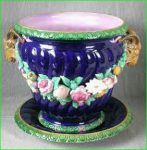 Majolica product / Maiolica Minton majolica jardinière and stand circa 1861, coloured lead glazes applied directly to the biscuit, shape first introduced at the 1851 Exhibition.