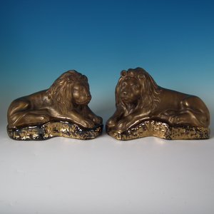 Pair Staffordshire Pottery Bronzed Lions
