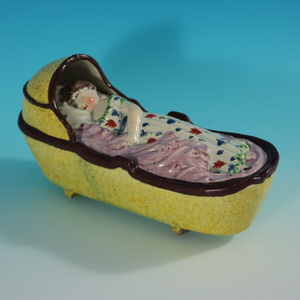 Staffordshire Pearlware Child In Rocking Cradle