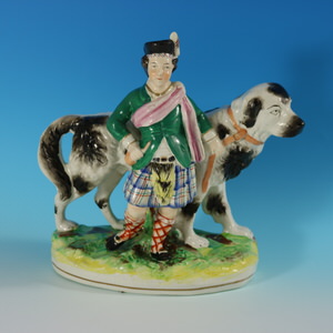 Staffordshire Pottery Boy with St. Bernard Figure
