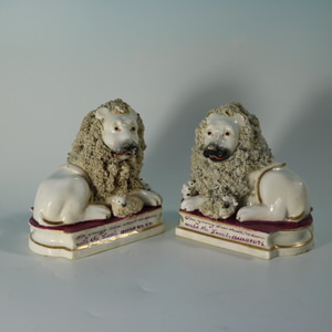 Pair of Shelton Staffordshire Lion and Lamb figures