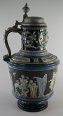 Large Majolica sacrifice scene pitcher with lid
