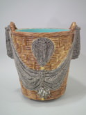 Majolica Fishing basket with draped net jardinière