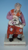 Staffordshire Pearlware Cobbler's wife figure