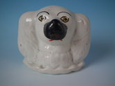 Staffordshire spaniel head money box