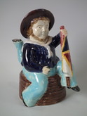 Majolica 3 legged Manx sailor teapot with flag