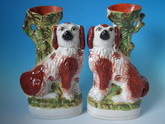 Pair Staffordshire russet&white spaniel spill vases