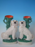 Pair Staffordshire spaniel spill vases
