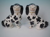 Pair Staffordshire Disraeli legs-free spaniels