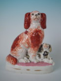 Staffordshire spaniel & pup figure on pink base