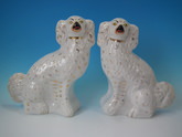 Pair Staffordshire white & gilt spaniels