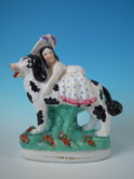 Staffordshire girl on Disraeli dog figure