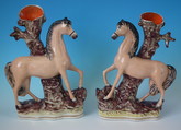 Pair Staffordshire horse spill vases