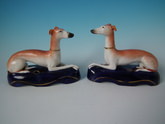 Pair Staffordshire whippet inkwells