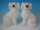 Pair Staffordshire white & gilt spaniels