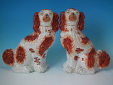 Pair Staffordshire russet&white curly tailed spaniels