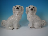 Pair Staffordshire white&gilt spaniels