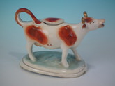 Staffordshire russet & white cow creamer