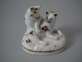 Small Staffordshire cats figure group