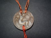 René Lalique clear with sepia staining Glass 'Fioret' Pendant/medallion