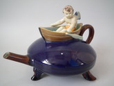 Holdcroft Majolica rowing cherub teapot