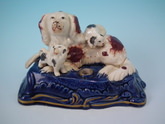 Staffordshire spaniel & pups inkwell
