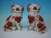 Pair Staffordshire leg free russet & white spaniels