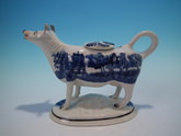Staffordshire cow creamer with blue&white transferware decoration