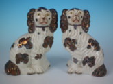 Pair Staffordshire No. 5 copper lustre spaniels