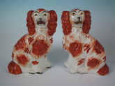 Pair Staffordshire russet and white spaniels