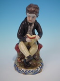 Pearlware Staffordshire boy reading a book