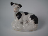 Small Staffordshire cow figure