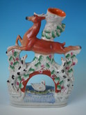 Staffordshire leaping stag, swan & dogs spill vase