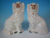 Pair Staffordshire white & gilt spaniels