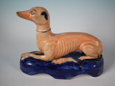 Large Staffordshire greyhound on cobalt blue base