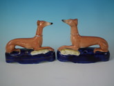 Pair Staffordshire whippet with hare inkwells