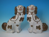 Pair Staffordshire Copper Lustre spaniels