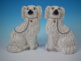 Pair Staffordshire white & gilt spaniels