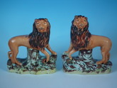 Pair Staffordshire standing lions