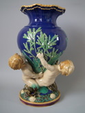 Minton majolica vase supported by three mermen
