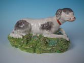 Staffordshire Pearlware Pottery recumbent dog / hound