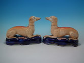 Large pair Staffordshire recumbent whippets with hares