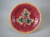 Majolica Plate with Leaves on red basket ground