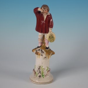 Staffordshire Weeping Child with Rabbits Quill Holder