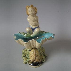 Majolica Merman on shell riding a dolphin salt