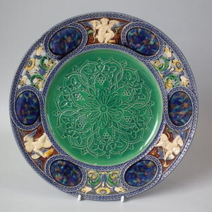 Minton Majolica plate with pierced rim and cherubs