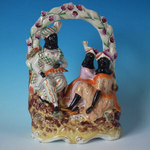 Staffordshire Pottery group of a travelling family