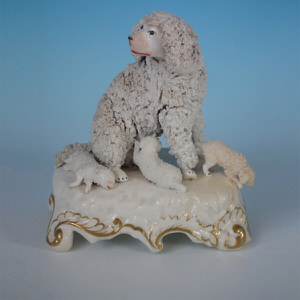 Staffordshire poodle & pups on Rococo base figure group