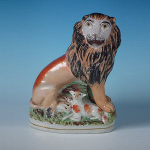 Staffordshire lion & lamb figure